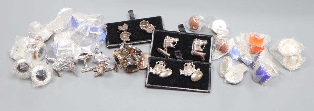 Five pairs of white metal novelty cuff links and sixteen pairs of white metal and stone/glass mounted cuff links, all marked 925